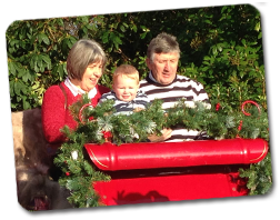 Family sat in Santas Sled